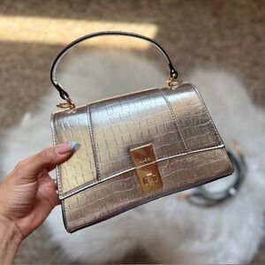 Aldo Metallic Silver Clutch